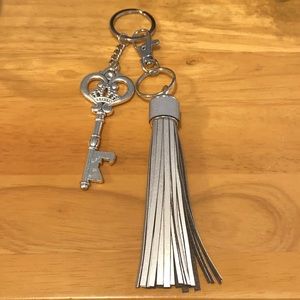 Silver tone keychain reflective tassel key charm